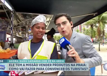 Dudu Camargo estreia como repórter do Balanço Geral e interage com banhistas em Praia Grande (SP)